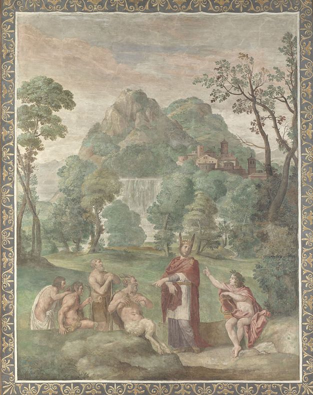 Painting. Five pale-skinned men and a satyr, a creature with a man’s body and goat’s legs, sit and stand long the bottom of a vertically oriented mountainous landscape. A man with ass’s ears, Midas, wears a crown and robes, and points to the satyr, Pan. A man to the other side, Apollo, holds a lyre and points up at Midas’s ears.